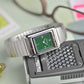 VARIO VERSA REVERSIBLE DUAL TIME EASTERN ARABIC GUNMETAL GREEN ENAMEL WATCH